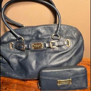 Michael Kors leather purse with two matching wallets